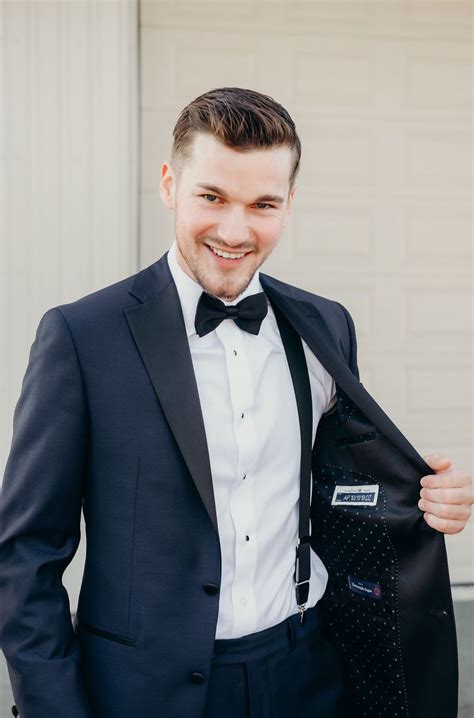 navy blue tuxedo with red bow tie|black suit with navy bow tie.